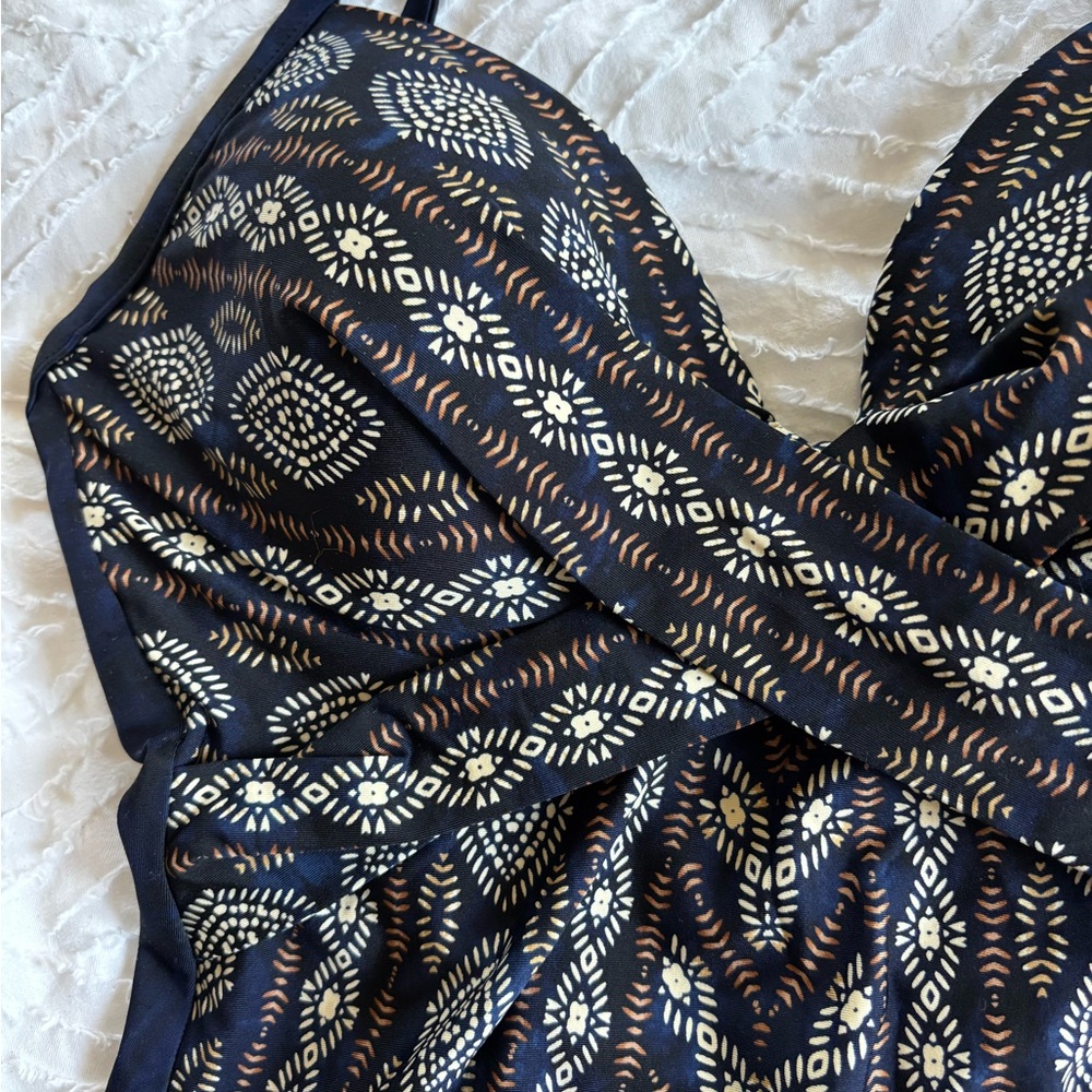Miracle Suit One Piece Twist Top Diamond Print Open Back. Like new! Retail $198